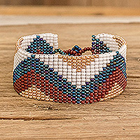 Glass beaded wristband bracelet, 'Geometric Waves' - Geometric Glass Beaded Wristband Bracelet from Guatemala