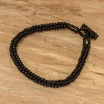 Glass beaded bracelet, 'Shadow Berries' - Black Glass Beaded Bracelet with Toggle Clasp