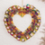 Cotton wreath, 'United by Love' - Handcrafted Heart-Shaped Cotton Worry Doll Wreath (image 2) thumbail