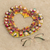 Cotton wreath, 'United by Love' - Handcrafted Heart-Shaped Cotton Worry Doll Wreath (image 2b) thumbail