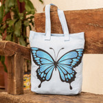 Hand-painted tote bag, 'Winter Wings' - Hand-Painted Butterfly-Themed Polyester Tote Bag in Blue
