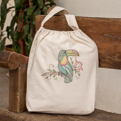 Embroidered cotton tote bag, 'Toucan Reflections' - Handcrafted Beige Cotton Tote Bag with Embroidered Details