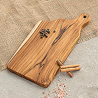 Wood cutting board, 'Mountains of Delight' - Handcrafted Medium Teak Wood Cutting Board in Light Brown