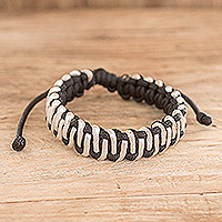 Handcrafted braided bracelet, 'Embraced Art' - Handcrafted Ivory and Black Braided Bracelet from Costa Rica