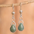 Jade dangle earrings, 'Harmony Drops' - Sterling Silver Dangle Earrings with Drop-Shaped Jade Stones (image 2) thumbail