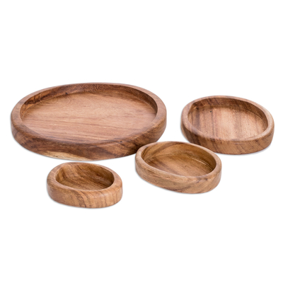 Wood snack plates, 'Delicacy Family' (set of 4) - Set of 4 Hand-Carved Conacaste Wood Snack Plates