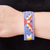 Glass beaded wristband bracelet, 'Flame Bird' - Handmade Bird-Themed Purple Glass Beaded Wristband Bracelet (image 2d) thumbail