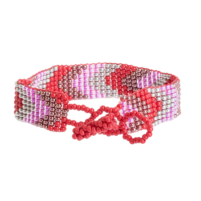 Glass beaded wristband bracelet, 'Berry Directions' - Handcrafted Geometric Pink Glass Beaded Wristband Bracelet
