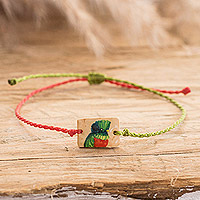Coconut shell macrame pendant bracelet, 'Quetzal Close Up' - Hand-Painted Coconut Shell Macrame Bird Pendant Bracelet