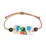 Onyx and coconut shell macrame beaded pendant bracelet, 'Chic Quetzal' - Onyx and Coconut Shell Macrame Beaded Bird Pendant Bracelet