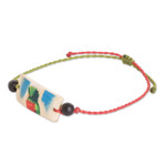 Onyx and coconut shell macrame beaded pendant bracelet, 'Chic Quetzal' - Onyx and Coconut Shell Macrame Beaded Bird Pendant Bracelet