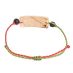 Onyx and coconut shell macrame beaded pendant bracelet, 'Chic Quetzal' - Onyx and Coconut Shell Macrame Beaded Bird Pendant Bracelet