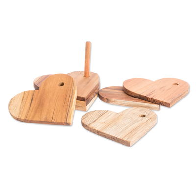 Teak coasters, 'United by Love' (set of 6) - 6 Heart-Shaped Teakwood Coasters with Stand from Guatemala