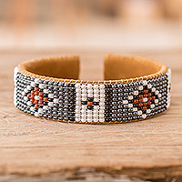 Leather-accented glass beaded cuff bracelet, 'Ancestor Diamonds' - Black and Brown Glass Beaded Cuff Bracelet with Leather