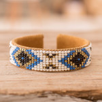 Leather-accented glass beaded cuff bracelet, 'Deity Diamonds' - Ivory and Blue Glass Beaded Cuff Bracelet with Leather