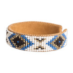 Leather-accented glass beaded cuff bracelet, 'Deity Diamonds' - Ivory and Blue Glass Beaded Cuff Bracelet with Leather