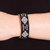 Leather-accented glass beaded cuff bracelet, 'Altar Diamonds' - Black and Blue Glass Beaded Cuff Bracelet with Leather