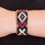 Leather-accented glass beaded cuff bracelet, 'Fire's Union' - Traditional Red and Black Glass Beaded Cuff Bracelet