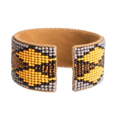 Leather-accented glass beaded cuff bracelet, 'Sunny Geometry' - Warm Geometric Glass Beaded Cuff Bracelet with Leather
