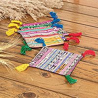 Cotton coasters, 'Land of Traditions' (set of 4) - Set of 4 Handcrafted Colorful Cotton Coasters with Tassels