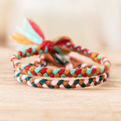 Braided friendship bracelets, 'Stand Together' (pair) - colourful Pair of Braided Friendship Bracelets from Guatemala