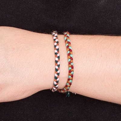 Braided friendship bracelets, 'Stand Together' (pair) - colourful Pair of Braided Friendship Bracelets from Guatemala