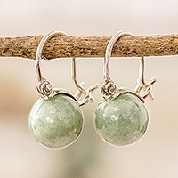 Jade hoop earrings, 'Serene Soul' - Polished Sterling Silver Hoop Earrings with Green Jade Gems