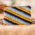 Beaded coin purse, 'Caramel Stripes' - Handcrafted Beaded Coin Purse with Colorful Stripes