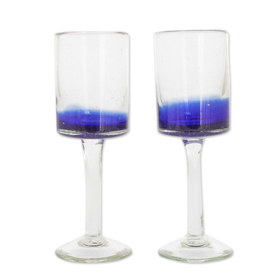 Handblown wine glasses, 'Oceanic Depths' (pair) - Blue-Accented Clear Handblown Wine Glasses (Pair)