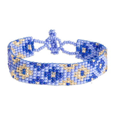 Glass beaded wristband bracelet, 'Dual Delight in Blue' - Handcrafted Blue and Golden Glass Beaded Wristband Bracelet