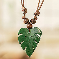 Wood and calabash gourd pendant necklace, 'Jungle Green' - Leafy Green Calabash Gourd Pendant Necklace with Wood Beads
