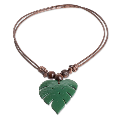 Wood and calabash gourd pendant necklace, 'Jungle Green' - Leafy Green Calabash Gourd Pendant Necklace with Wood Beads