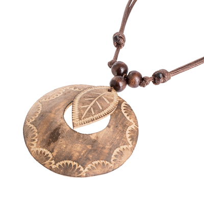 Wood and calabash gourd pendant necklace, 'Memories from the Forest' - Leafy Round Calabash Gourd Pendant Necklace with Wood Beads