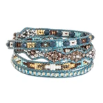 Beaded wrap bracelet, 'Blue Country Flowers' - Hand-Woven Beaded Wrap Bracelet in Blue with Pewter Button