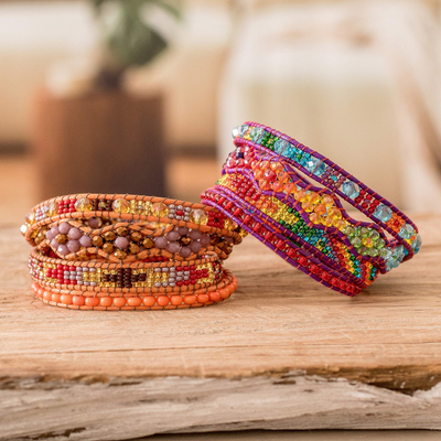 Beaded wrap bracelets, 'Lake Festival' (pair) - 2 Hand-Woven Beaded Wrap Bracelets in Orange and Purple