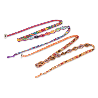 Beaded wrap bracelets, 'Lake Festival' (pair) - 2 Hand-Woven Beaded Wrap Bracelets in Orange and Purple