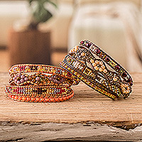 Beaded wrap bracelets, 'Atitlan Roads' (pair) - 2 Hand-Woven Beaded Wrap Bracelets in Orange and Brown