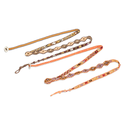 Beaded wrap bracelets, 'Atitlan Roads' (pair) - 2 Hand-Woven Beaded Wrap Bracelets in Orange and Brown