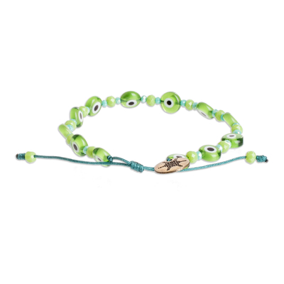 Crystal and glass beaded bracelet, 'Green Protection' - Crystal and Nazar Glass Beaded Bracelet in Green Hues