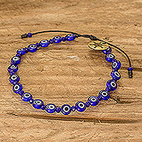 Crystal and glass beaded bracelet, 'Blue Guards' - Adjustable Blue Crystal and Nazar Glass Beaded Bracelet