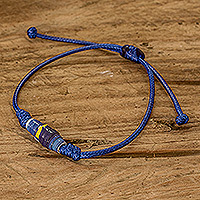 Recycled paper pendant bracelet, 'Earth's Riches in Blue' - Blue Recycled Paper Pendant Bracelet with Adjustable Cord
