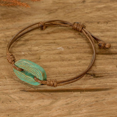 Recycled paper pendant bracelet, 'Vision in Aqua' - Handmade Cord Bracelet with Recycled Paper Pendant in Aqua