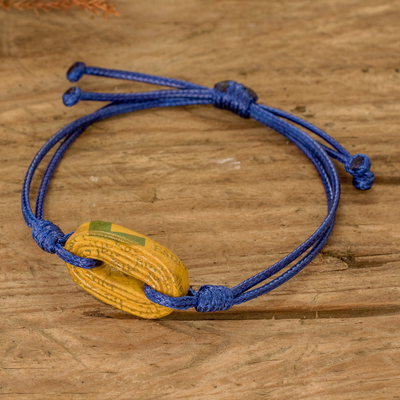 Recycled paper pendant bracelet, 'Vision in Yellow' - Handmade Cord Bracelet with Yellow Recycled Paper Pendant