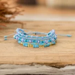 Multi-strand beaded bracelet, 'Serene Radiance' - Handmade Multi-Strand Glass Beaded Bracelet in Light Blue