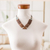 Coconut shell and ceramic statement necklace, 'Trendy Timber' - Coconut Shell & Ceramic Statement Necklace with Cotton Cord