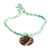 Coconut shell braided pendant bracelet, 'Tropical Turtle' - Cotton Braided Bracelet with Coconut Shell Turtle Pendant