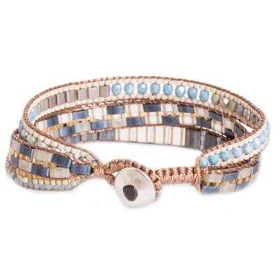 Beaded wristband bracelet, 'Serene Coast' - Handmade Blue and Golden Glass Beaded Wristband Bracelet