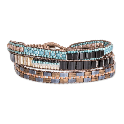 Beaded wristband bracelet, 'Nocturnal Beach' - Handmade Black and Turquoise Glass Beaded Wristband Bracelet