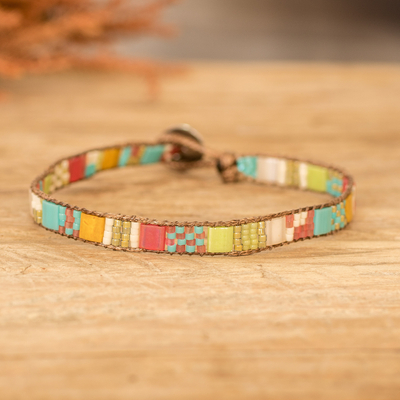 Glass beaded wristband bracelet, 'Turquoise Sunrise' - Bohemian Multicolor Glass Beaded Wristband Bracelet