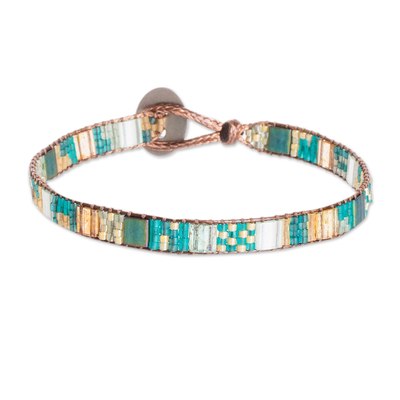 Glass beaded wristband bracelet, 'Serene Lagoon' - Bohemian Turquoise and Green Glass Beaded Wristband Bracelet